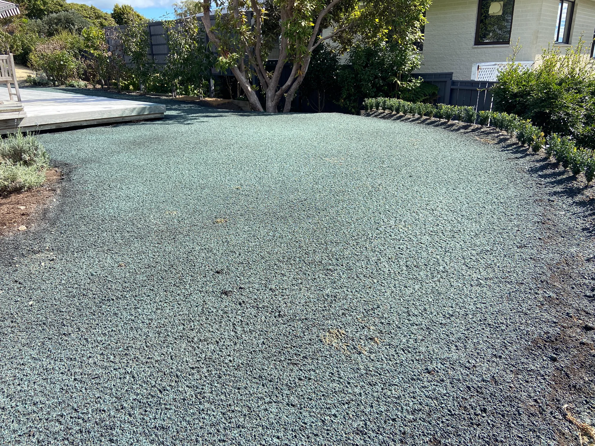 Applying hydroseed slurry to a new residential lawn
